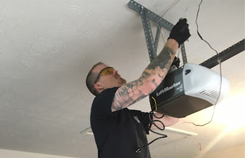 Technician Installing Opener